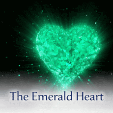 Glowing emerald crystal heart radiating light on a dark background